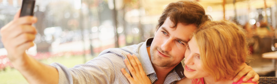 Couple using a Security Clearance Card to build trust when meeting in person